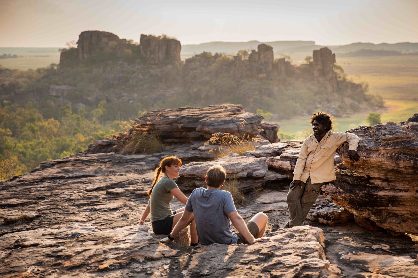 Visitors looking over the Kakadu landscape with an Aboriginal guide from Kakadu Cultural Tours