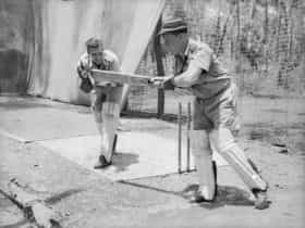 1943 - Sqn Leader Bluey Truscott batting, Flying Officer EB Tainton keeping.
