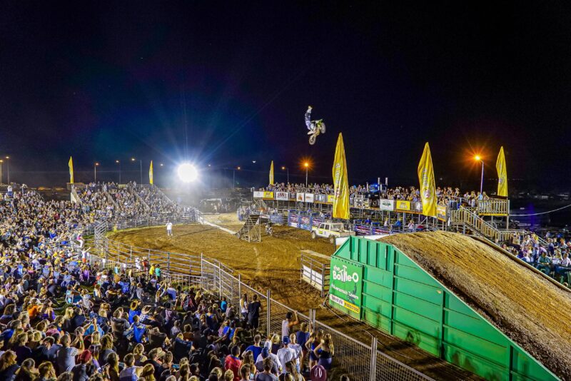 Flying high Freestyle Motox in front of large rodeo crowd