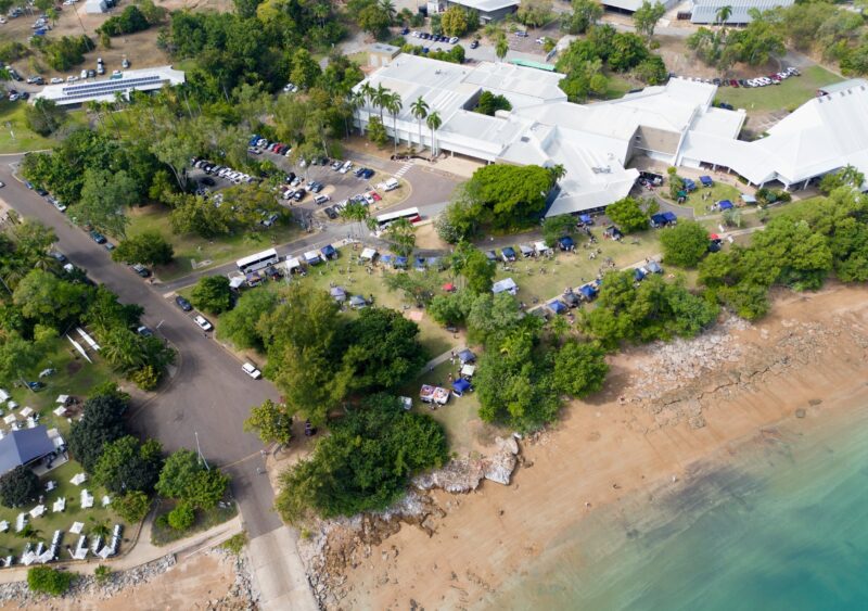 Dragonfly Craft Fair and Museum buildings by the sea, taken from the air.