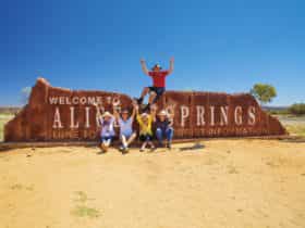 AAT Kings guide and guests in Alice Springs