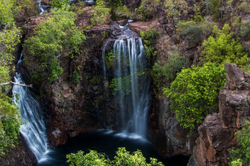 See cascading waterfalls at Litchfield National Park