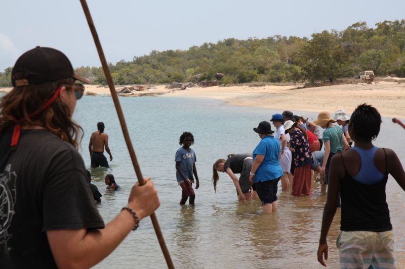 Guests in the water learning from Yolŋu guides