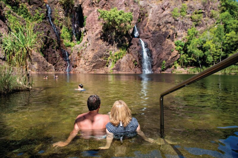 Couple taking a dip at Wangi Falls