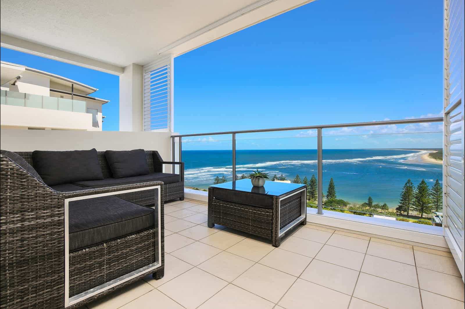 Balcony view from Tower one penthouse. Bulcock Beach and Bribie Island Coastline.