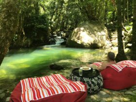 Afternoons relaxing by the swimming hole at Daintree Secrets