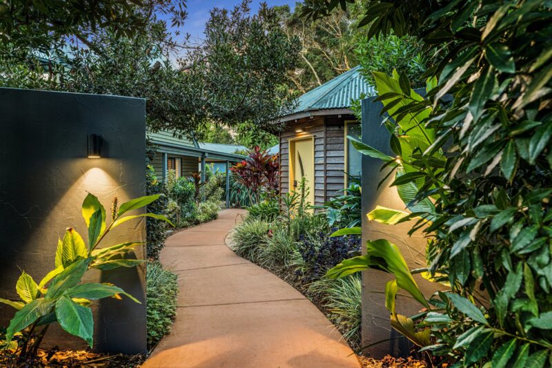 A pathway leading thorugh tropical gardens into Jandar Retreat