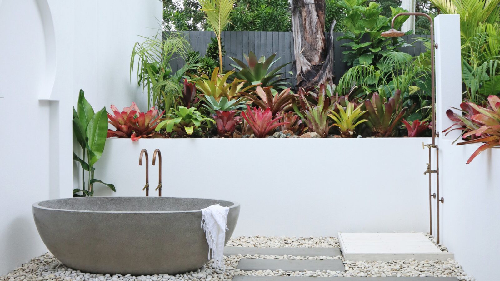 Soak in your private outdoor stone bath