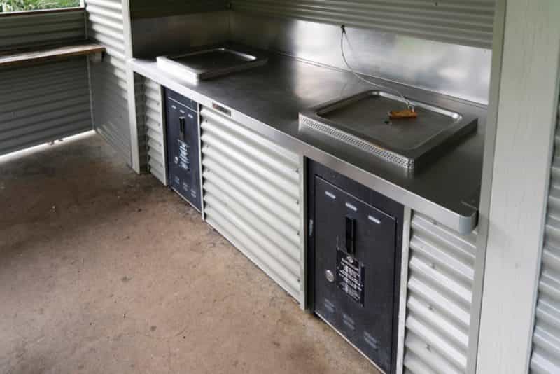 Two BBQs in cooking shelter.