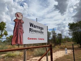 The sign for The Warrego Riverside Tourist Park.