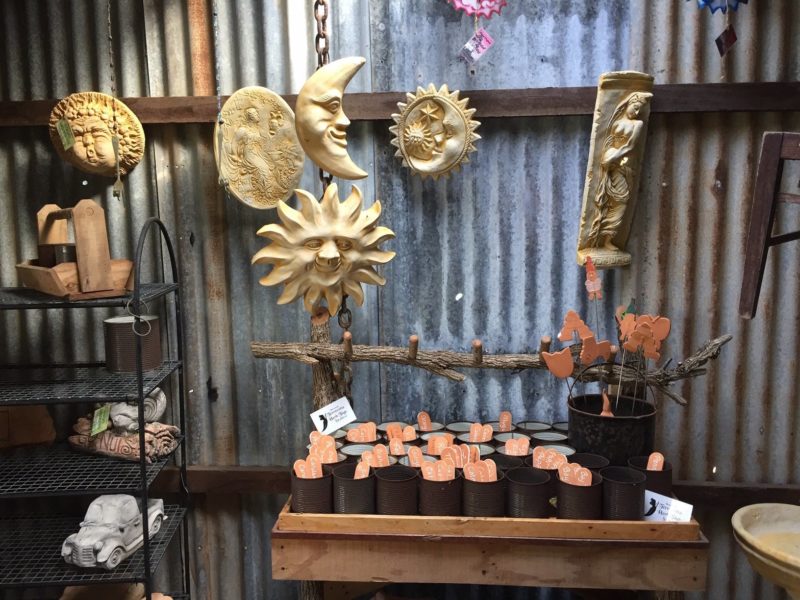 photo showing some hand made ceramic items on display