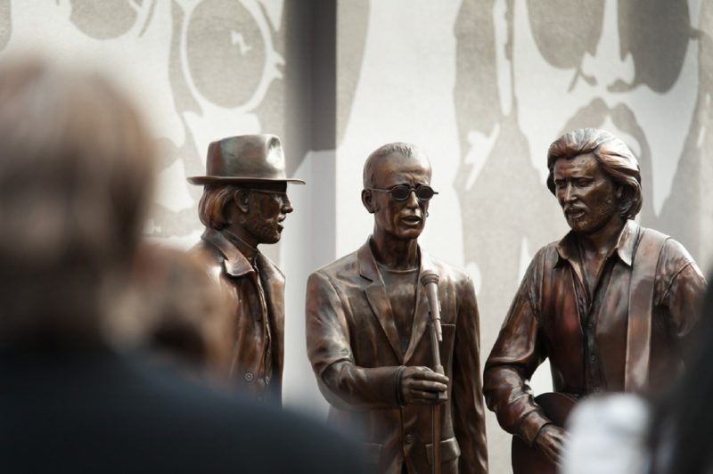 Life-sized bronze statue of the three Gibb brothers