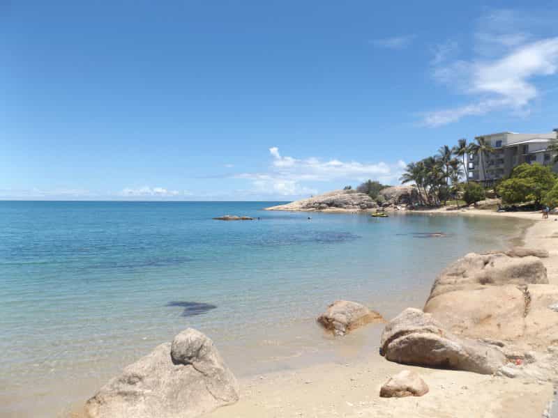 resort accommodation and sunny beach at Grays Bay Bowen