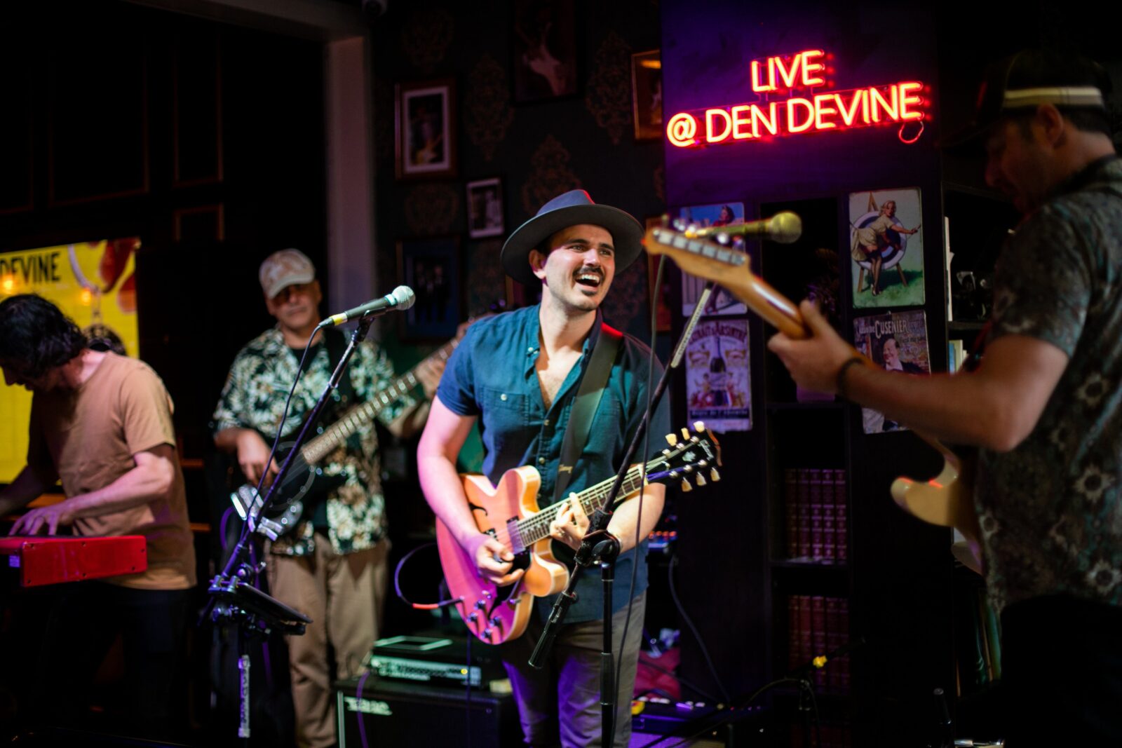 Den Devine's electrifying stage sets the scene for legendary live music, rocking 6 nights a week