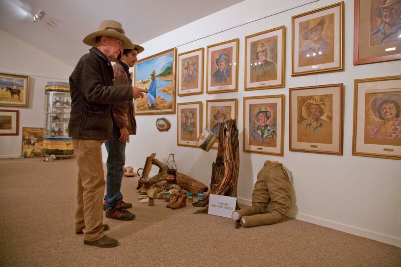 Pic Willetts (drover) showing his grandson theDrover's portraits in the bush art gallery