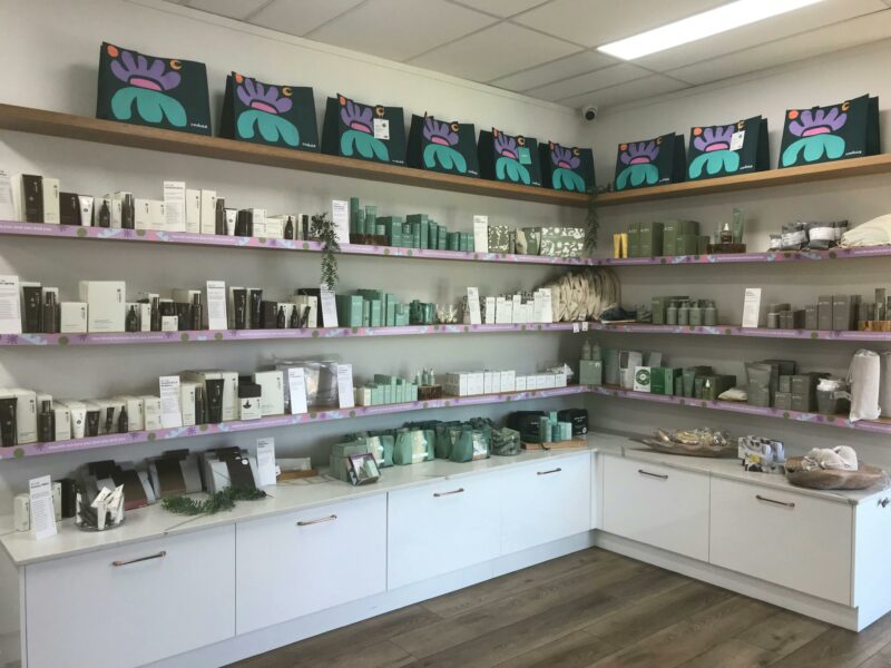 Retail shelving of skincare and wellness products available for purchase