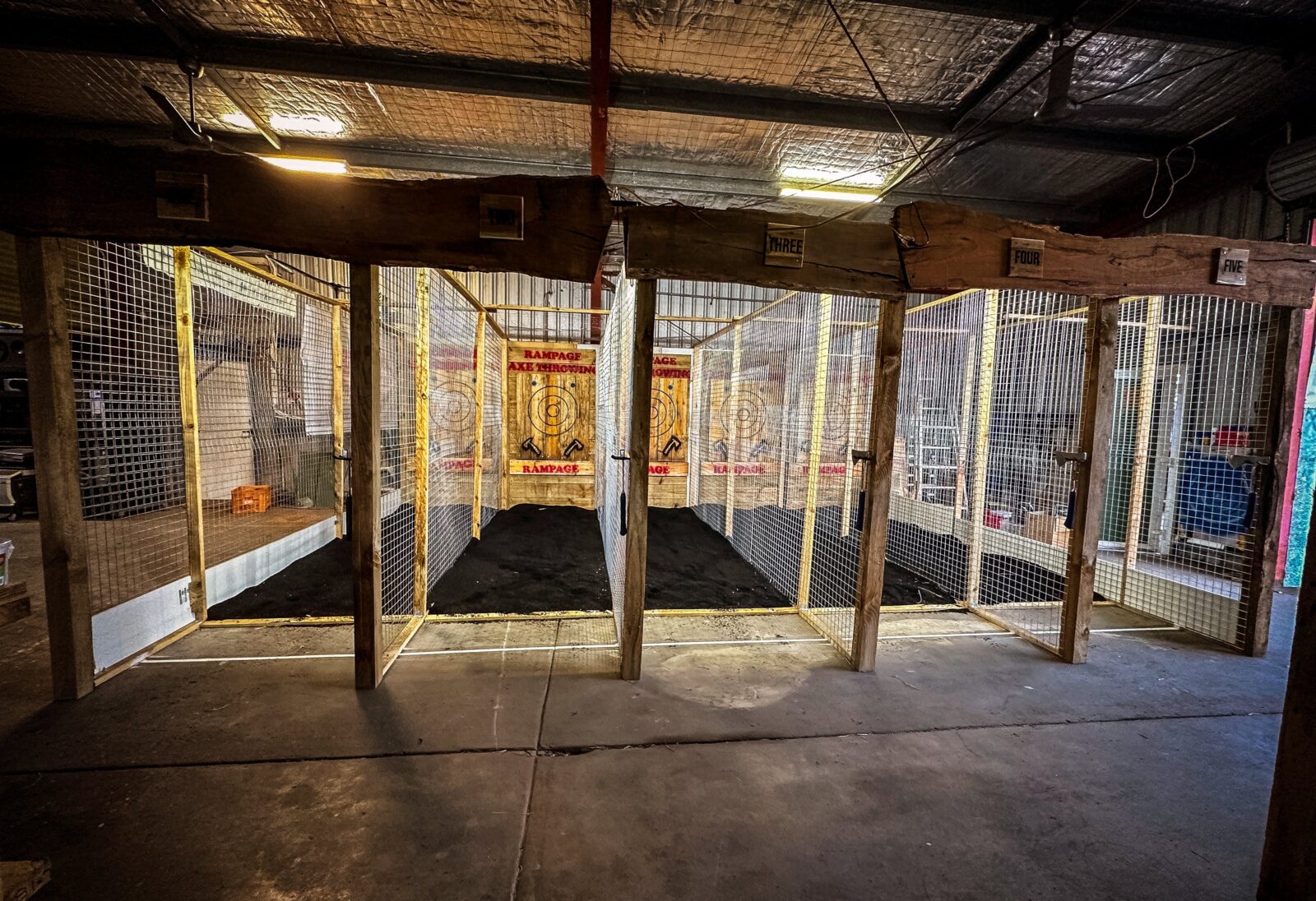 Five axe throwing cages