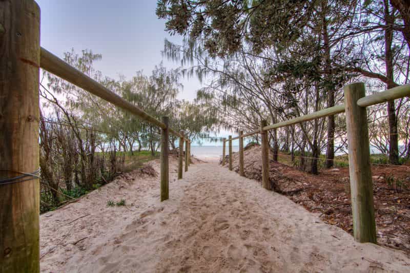 Entry walkway to beach at dusk