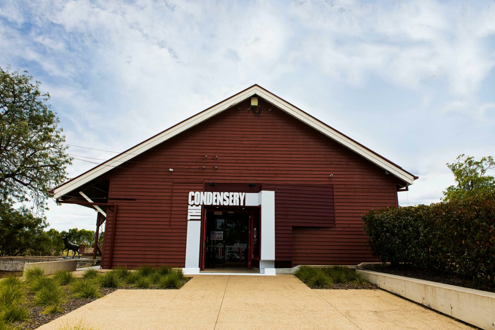 The entrance to The Condensery - Somerset Regional Art Galleery - maroon building
