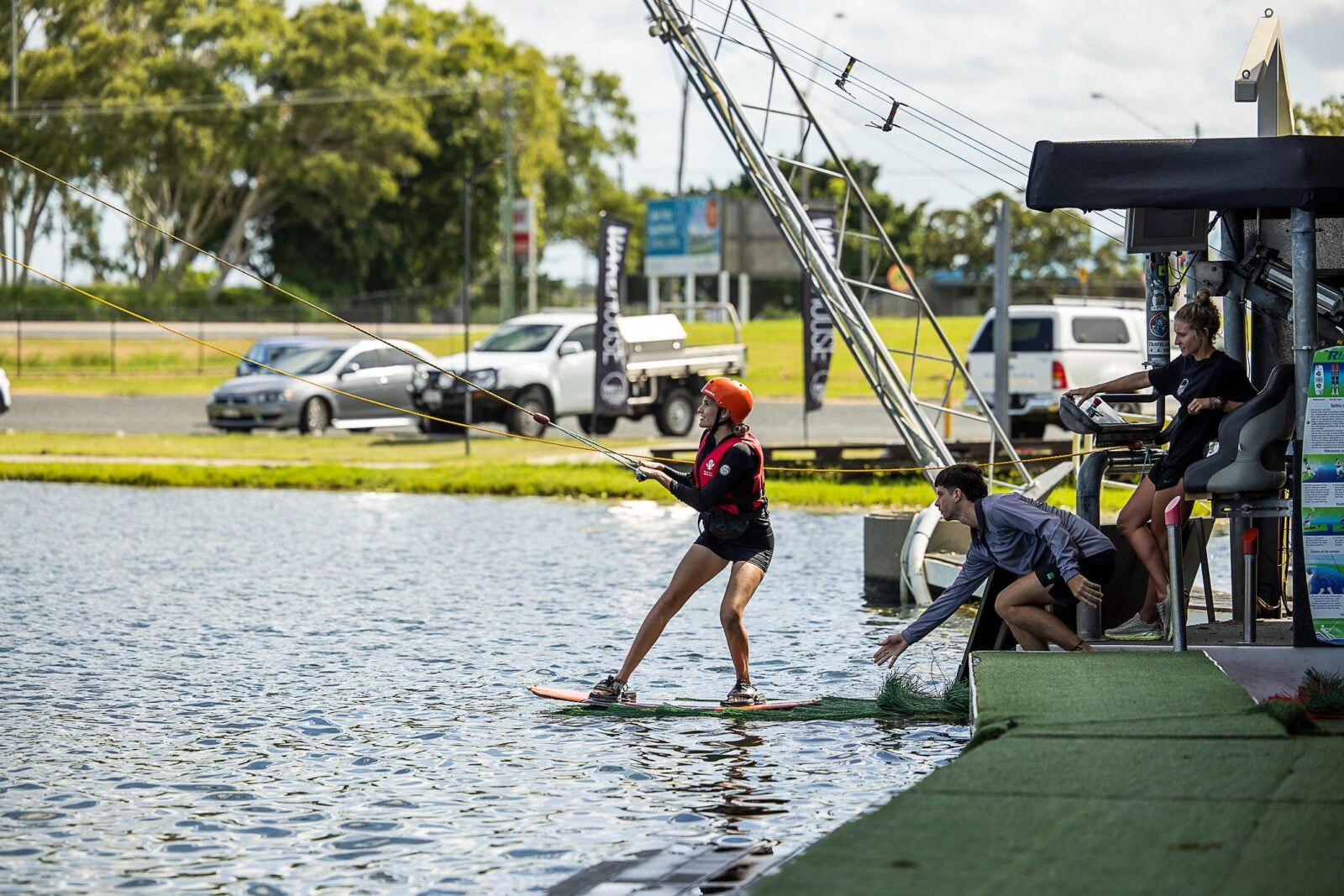 Young women learning how to wakeboard at Wake House Australia in Mackay