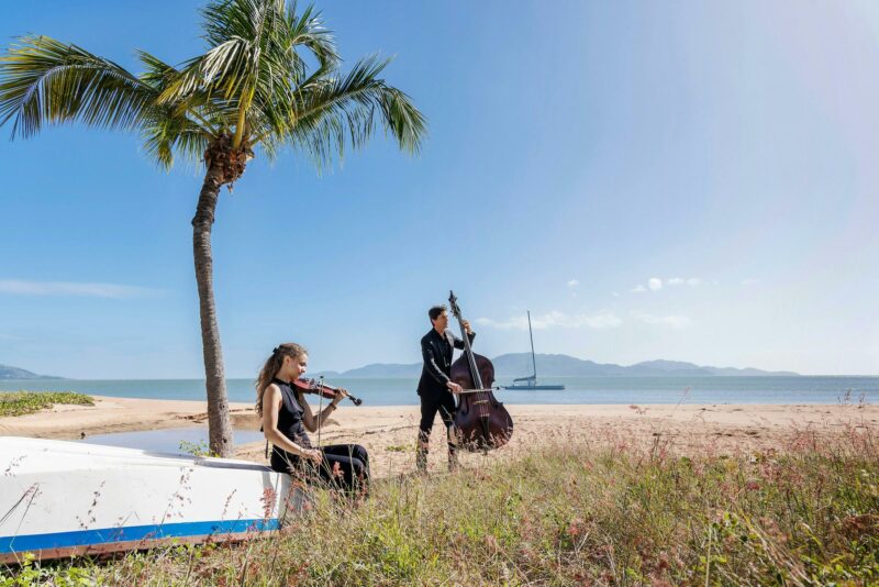 AFCM Musicians performing on beach in Townsville