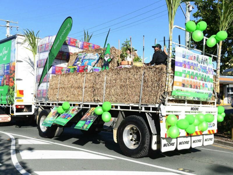 Business truck with sugar cane and posters celebrating in the Beenleigh Cane Parade