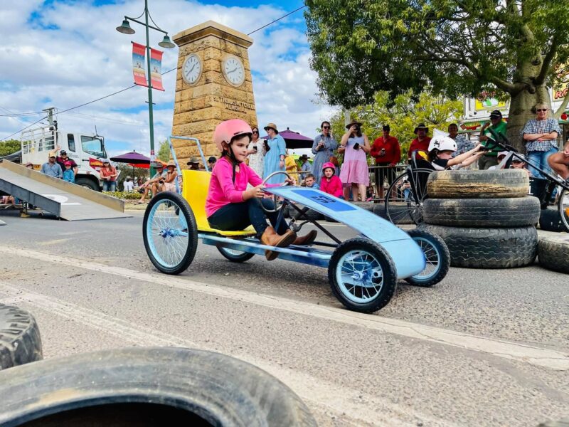 Young girl participating in the Better In Blackall billy cart races