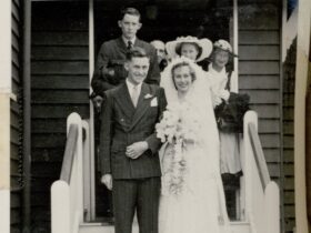 A black and white photo of a wedding ceremony.