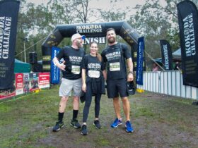 Women and two men at the finish line for Brisbane Kokoda Challenge 2022