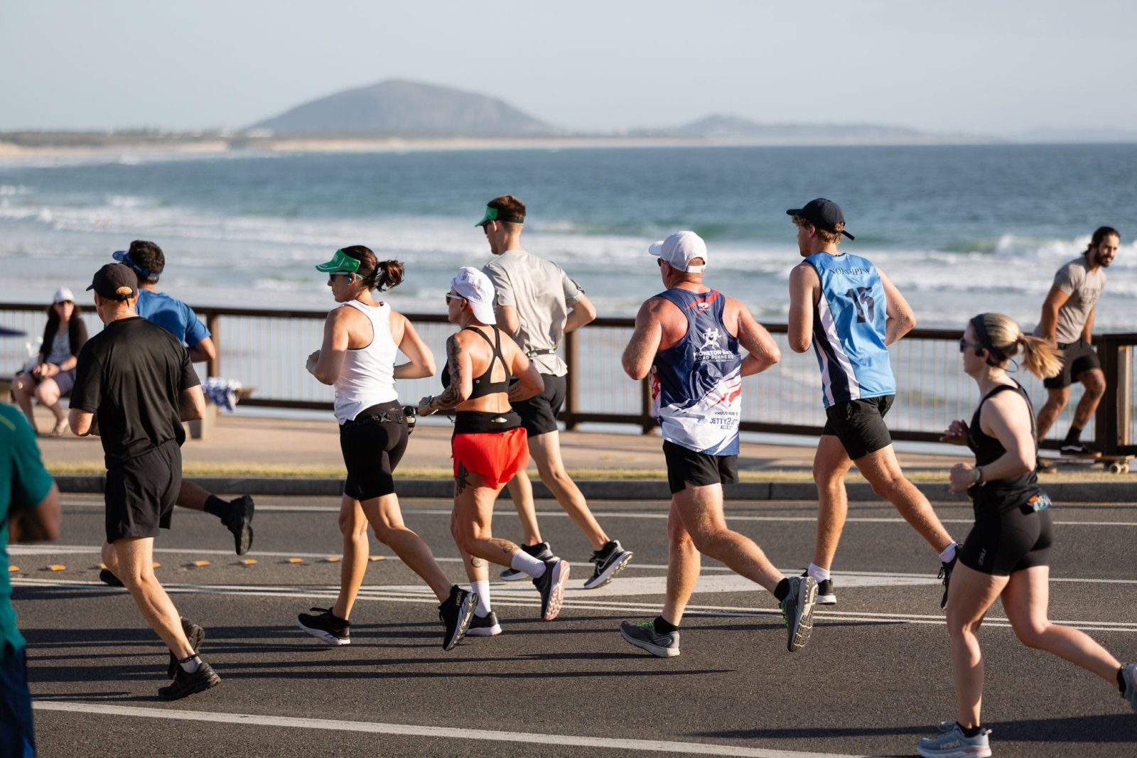 Group of runners near the beach