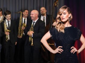 Women standing with hands on hips and swing band behind her