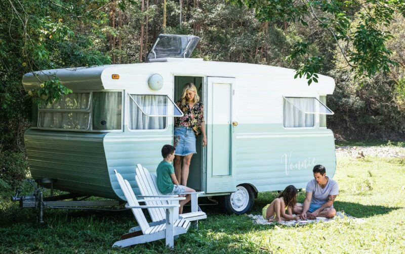 Young Family with their vintage caravan