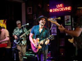 Den Devine's electrifying stage sets the scene for legendary live music, rocking 6 nights a week!