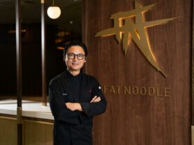 Fat Noodle Executive Chef Luke Nguyen, arms folded in front of new Fat Noodle at The Star Brisbane