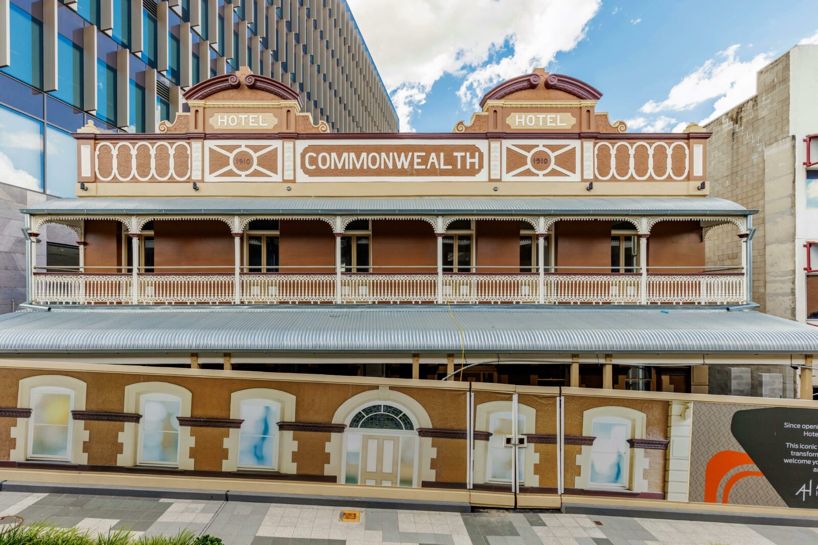 Front of the Hotel Commonwealth heritage-listed building in Ipswich. Construction barricade in front