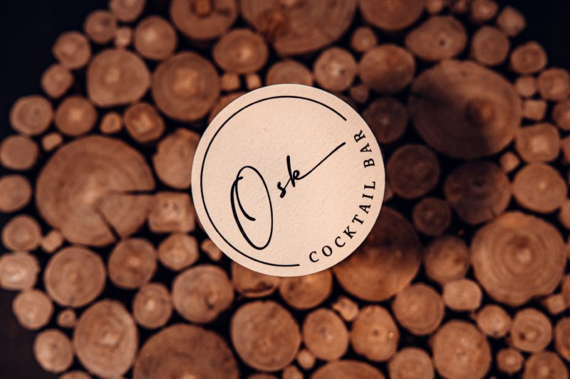 flat lay image of an Osk coaster on a timber stool