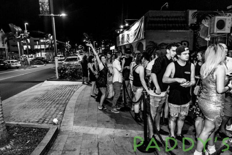 A crowd of people line up to enter Paddys Shenanigans in Airlie Beach