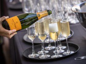 Champagne being poured into champagne flutes