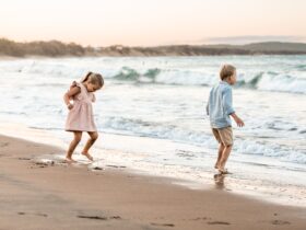 Beautiful sunset lit beaches and your kids photographed playing naturally