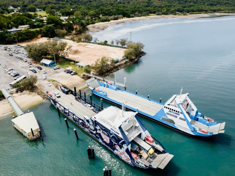 Two large vehicle ferries moored at port in Dunwich on North Stradbroke Island