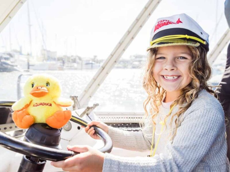 Girl driving the duck