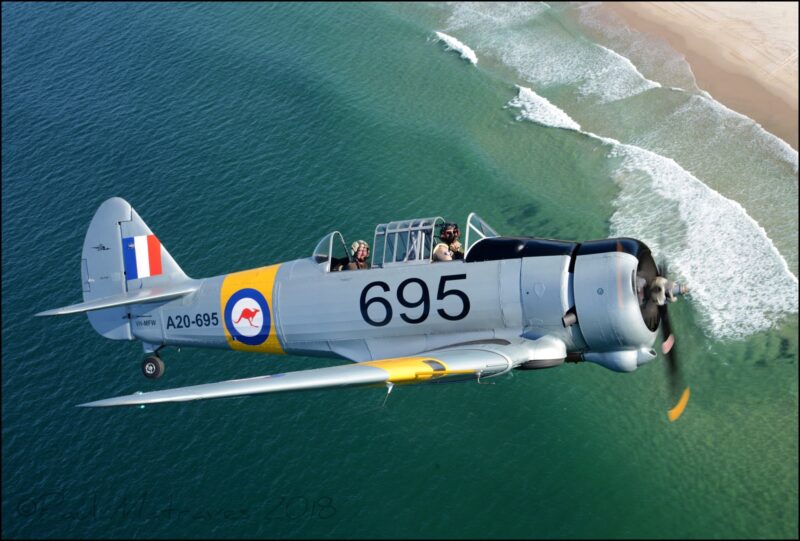 Wirraway 695 flying over the breathtakingly beautiful Bribie Beaches along Moreton Bay.