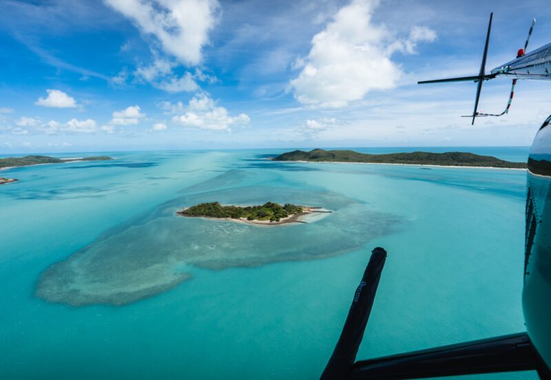 Coastal Rotors helicopter flying over the stunning Torres Strait Islands