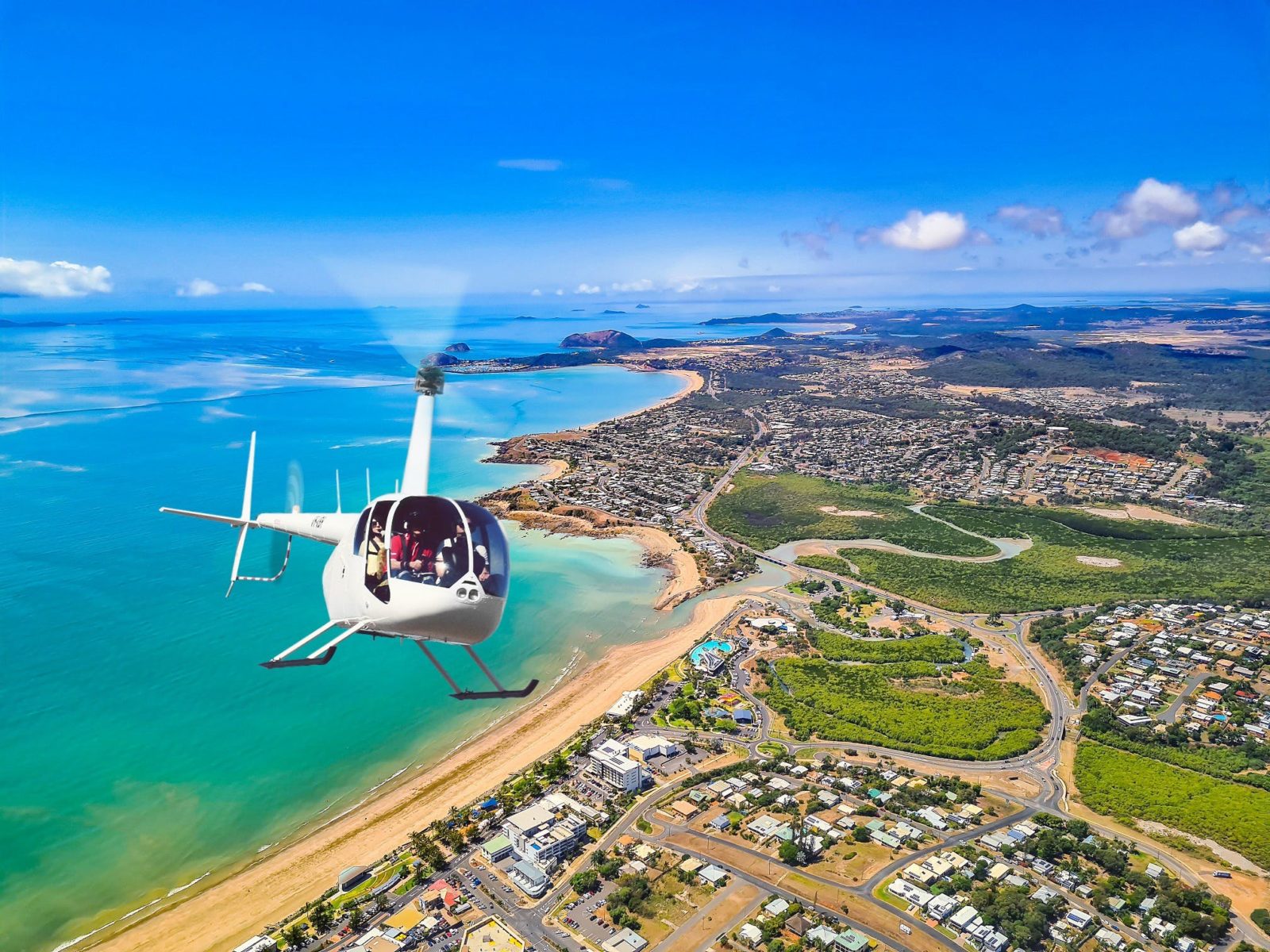 Photo of helicopter flying over Capricorn Coast