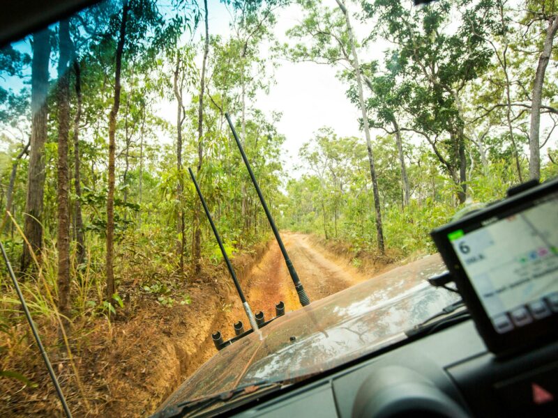 View from passenger seat of a 4WD car driving an offroad dirt track with a steep sideway angle!