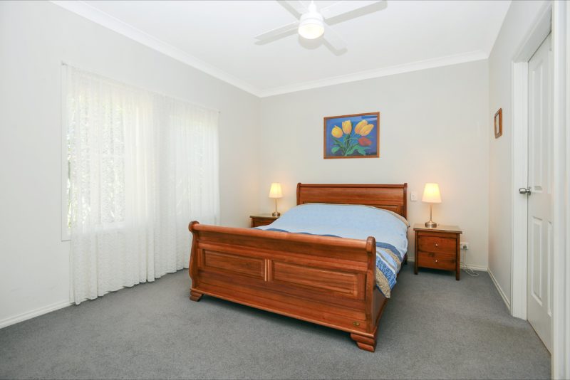 Front bedroom with Queen sized bed, walk in robe, ensuite bathroom with shower and toilet