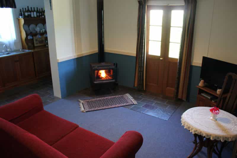 sitting room with slow combustion log fire