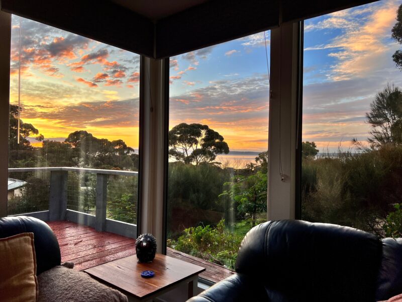 Enjoy the sunrise from Horizon Eco Apartment 1 from the lounge living room or outside on the sundeck