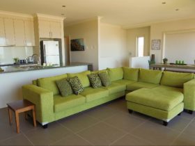 LOUNGE ROOM, KITCHEN, DINING - OPEN PLAN LIVING THE SOFA PERFECTLY PLACED TO SOAK IN THE VIEW