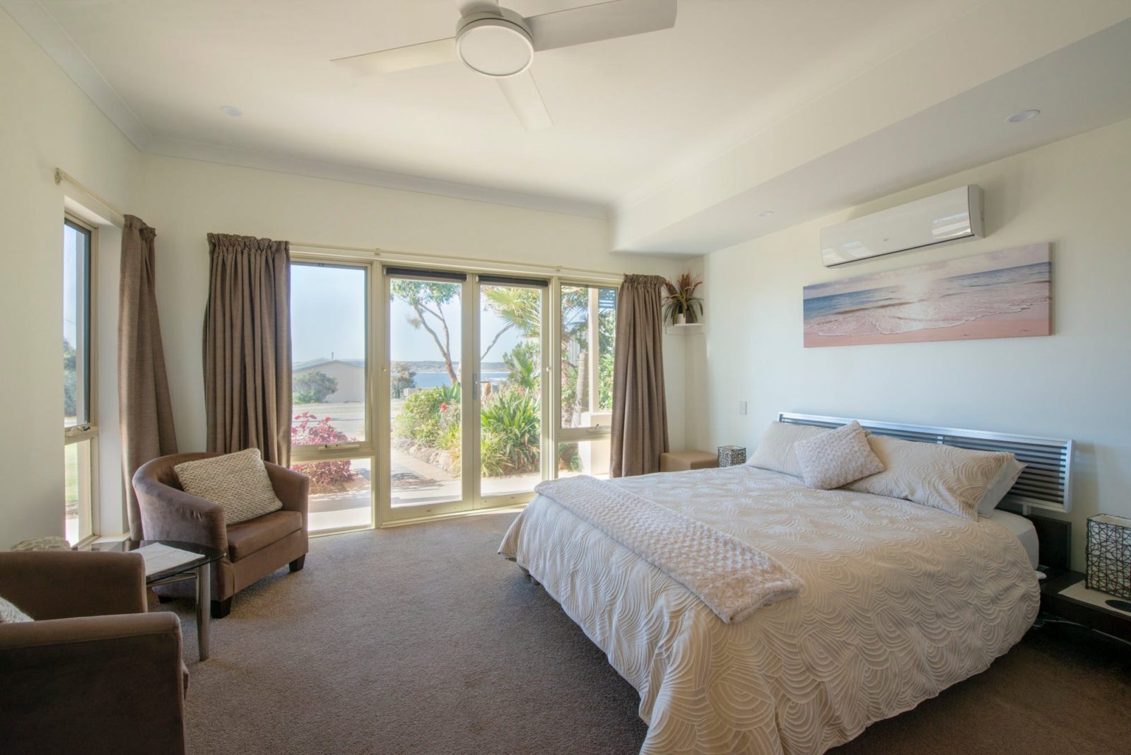 Searenity Holiday Apartment, Emu Bay, Kangaroo Island - spacious bedroom with sea views.